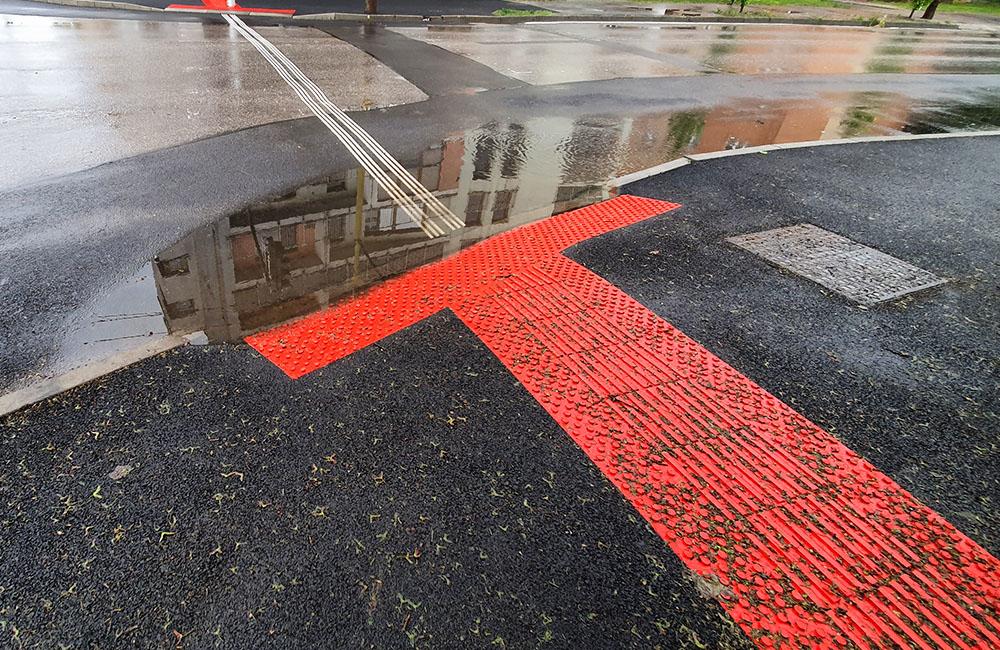 FOTO: Prvý dážď odhalil nedostatky zrekonštruovanej križovatky na Komenského ulici, foto 7